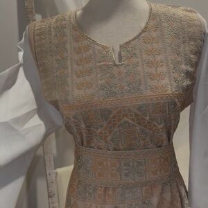 Embroidered Beige and Gold Dress machine made Thobe .